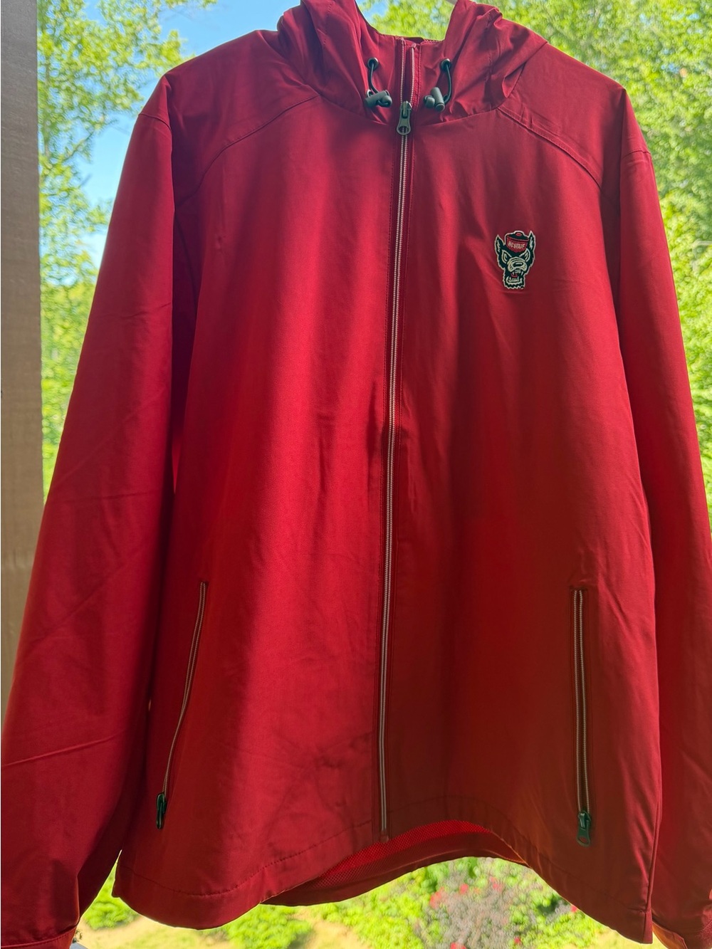 NC State- Red Hooded Windbreaker Jacket with Embroidered Patch